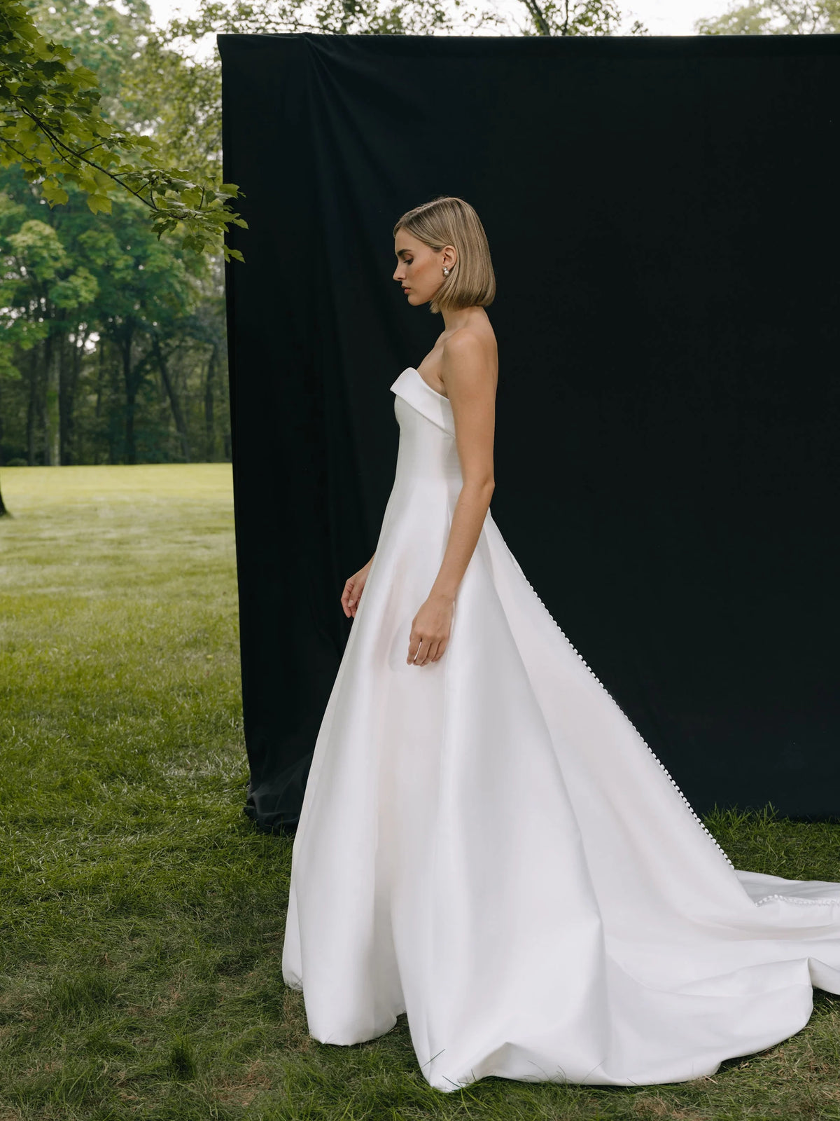 Ivory floor-length wedding dress, alternate view showing the full-length profile