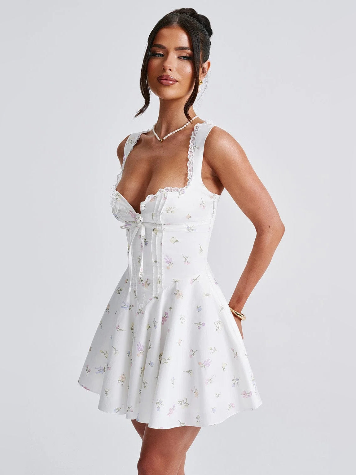 Floral mini homecoming dress, alternate view showing the full-length profile