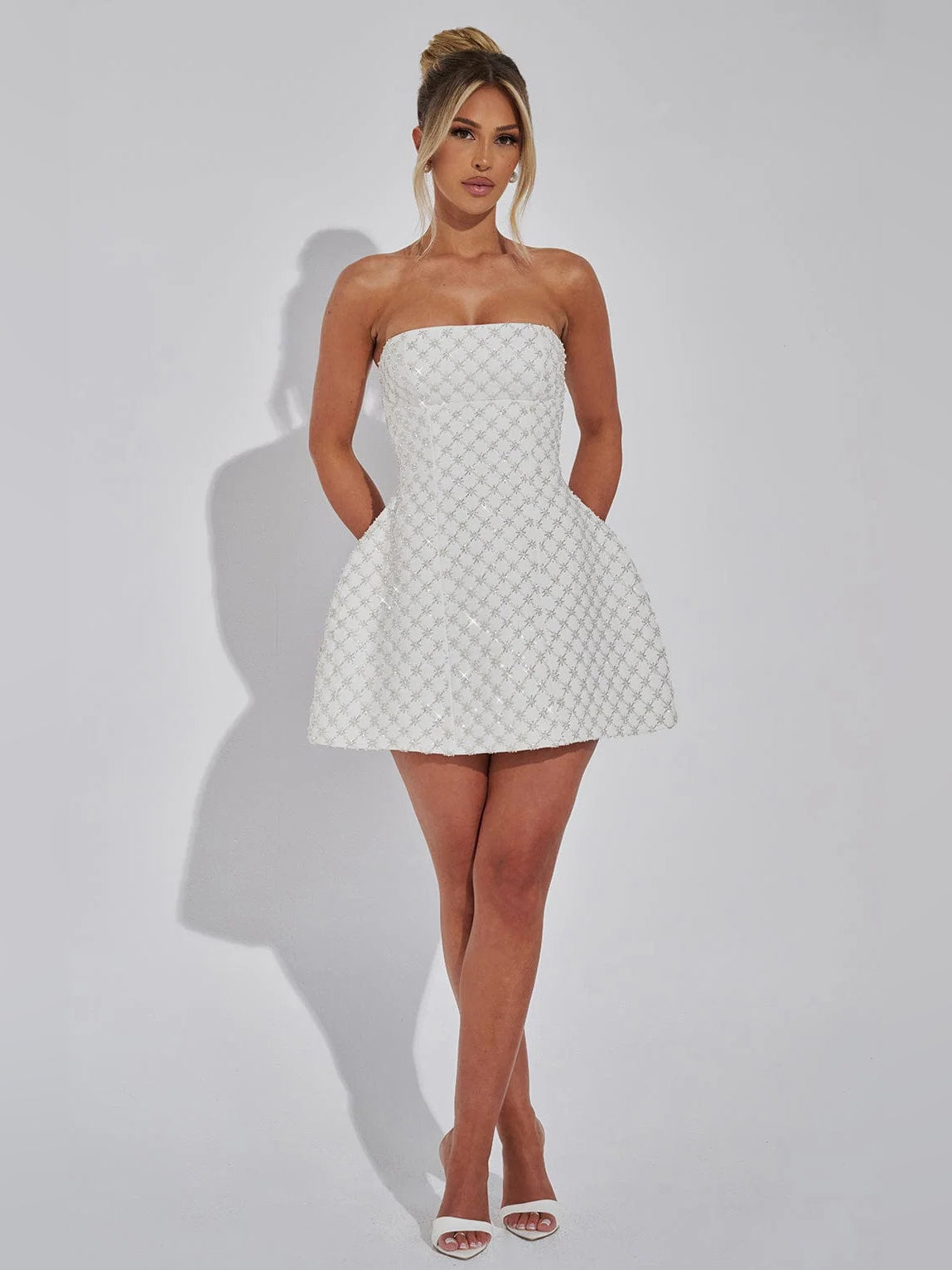 Ivory mini homecoming dress, alternate view showing the full-length profile