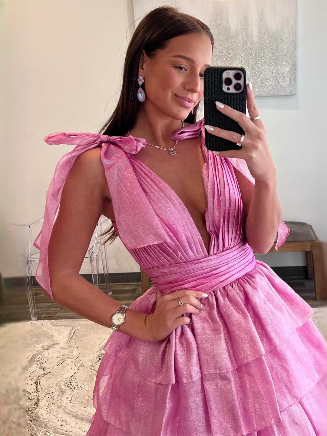 Pink maxi prom dress, back view showing the rear of the dress showing the garment from a different position