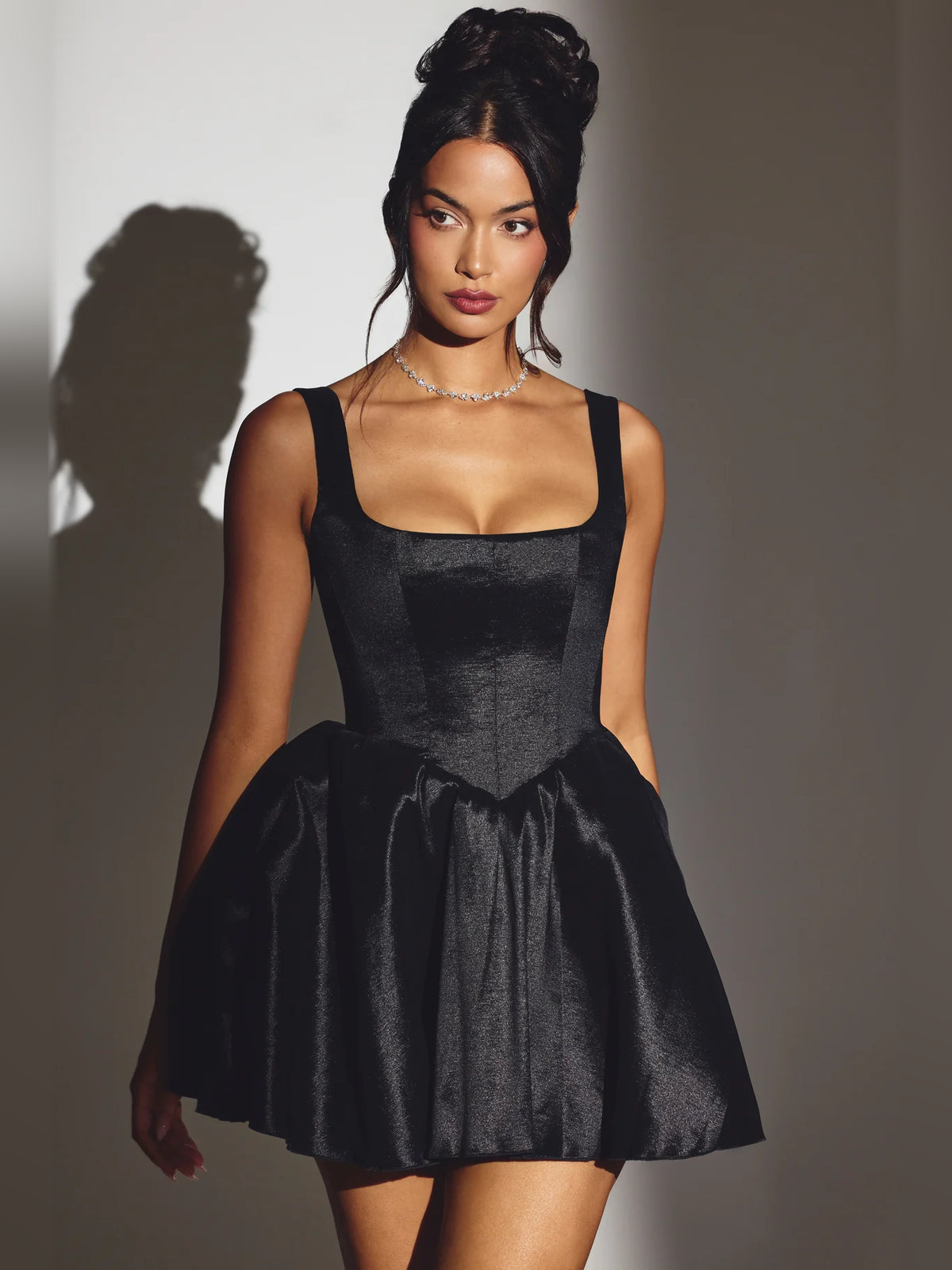 Black mini homecoming dress, alternate view showing the full-length profile