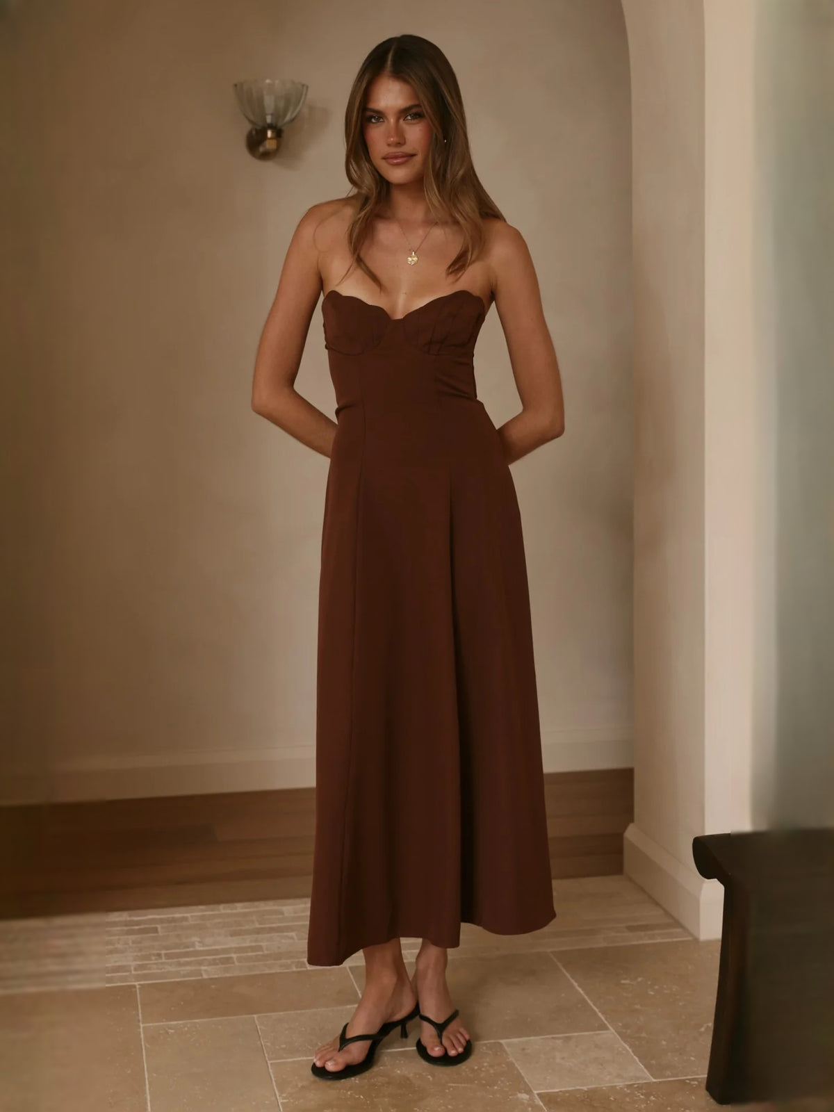 Chocolate midi formal dress with strapless neckline, alternate view showing the hem