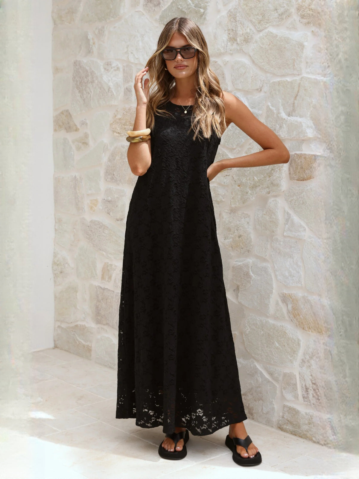 Black a-line maxi formal dress with V-neckline, alternate view showing the hem