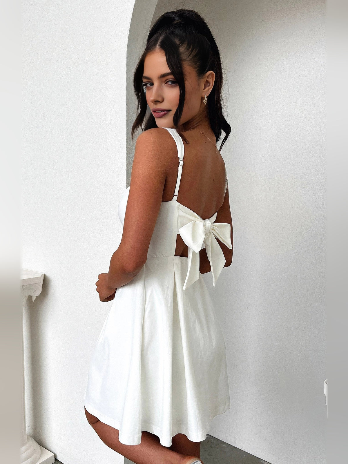 Ivory white mini homecoming dress, alternate view showing the full-length profile