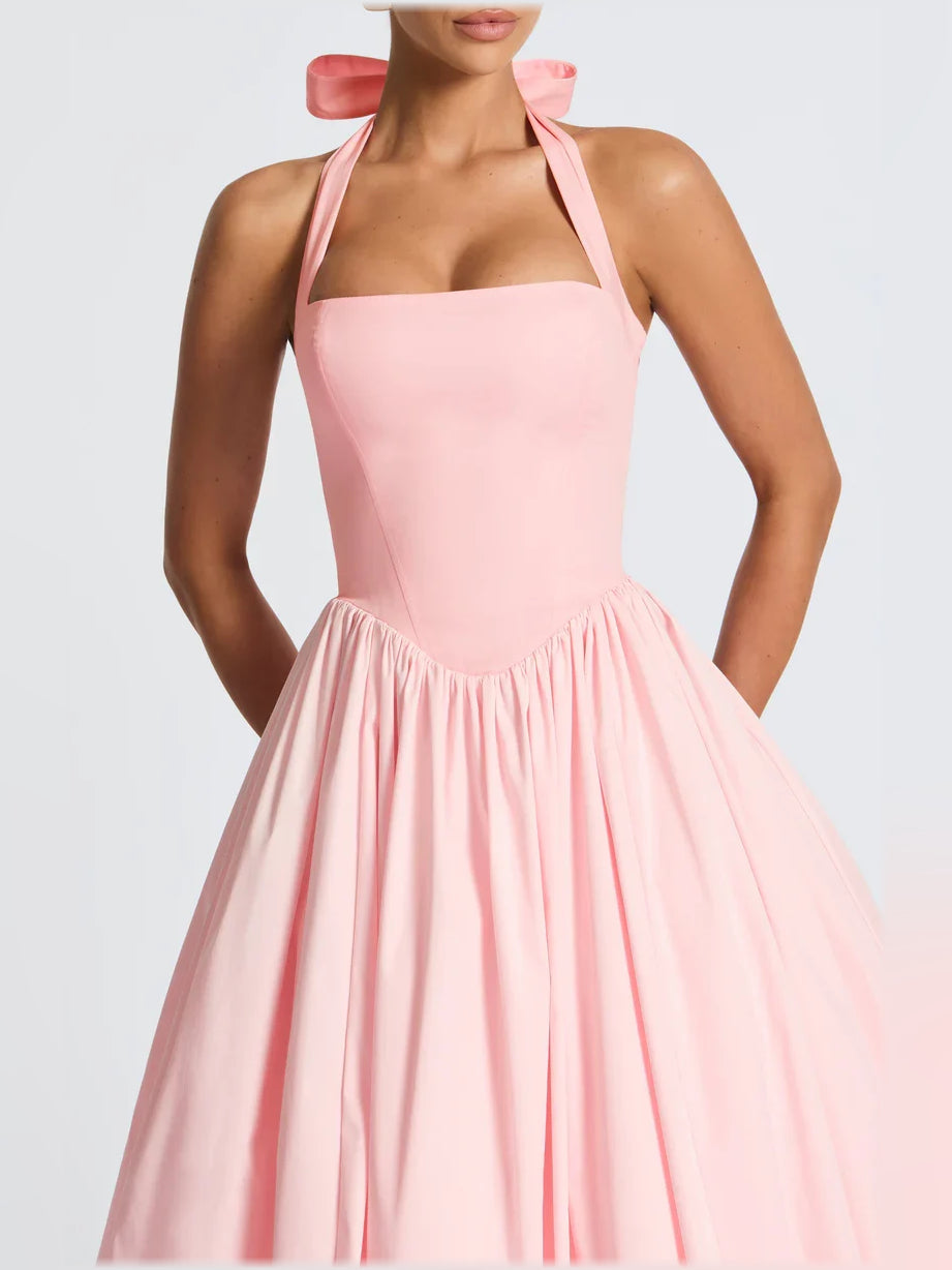 Black a-line midi formal dress with halter neckline, alternate view showing the hem