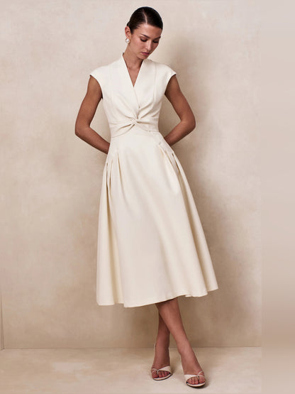 Cream midi formal dress with V-neckline, alternate view showing the hem