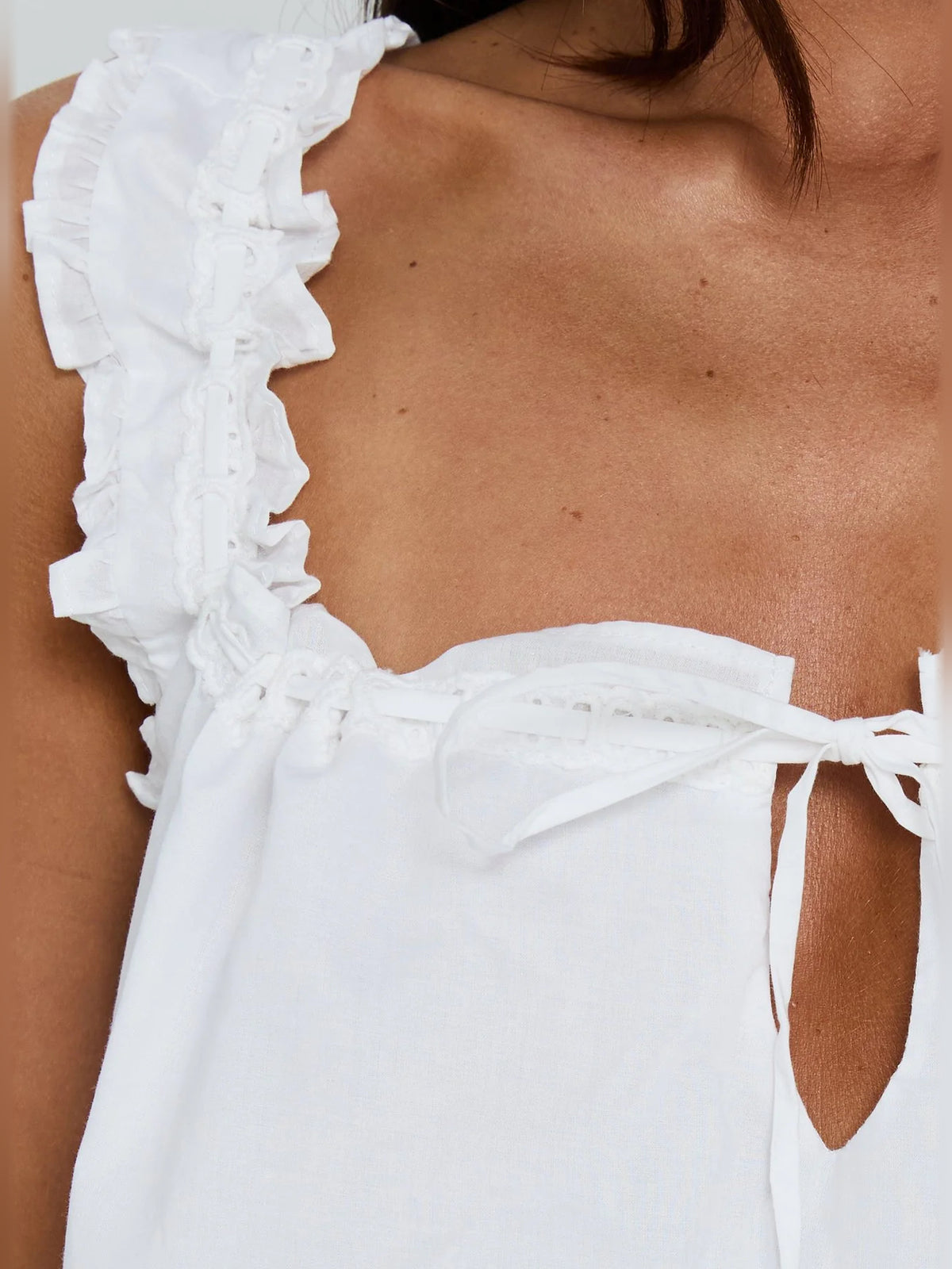 White mini homecoming dress, alternate view showing the full-length profile