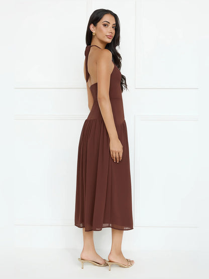 Brown midi formal dress with halter neckline, alternate view showing the hem