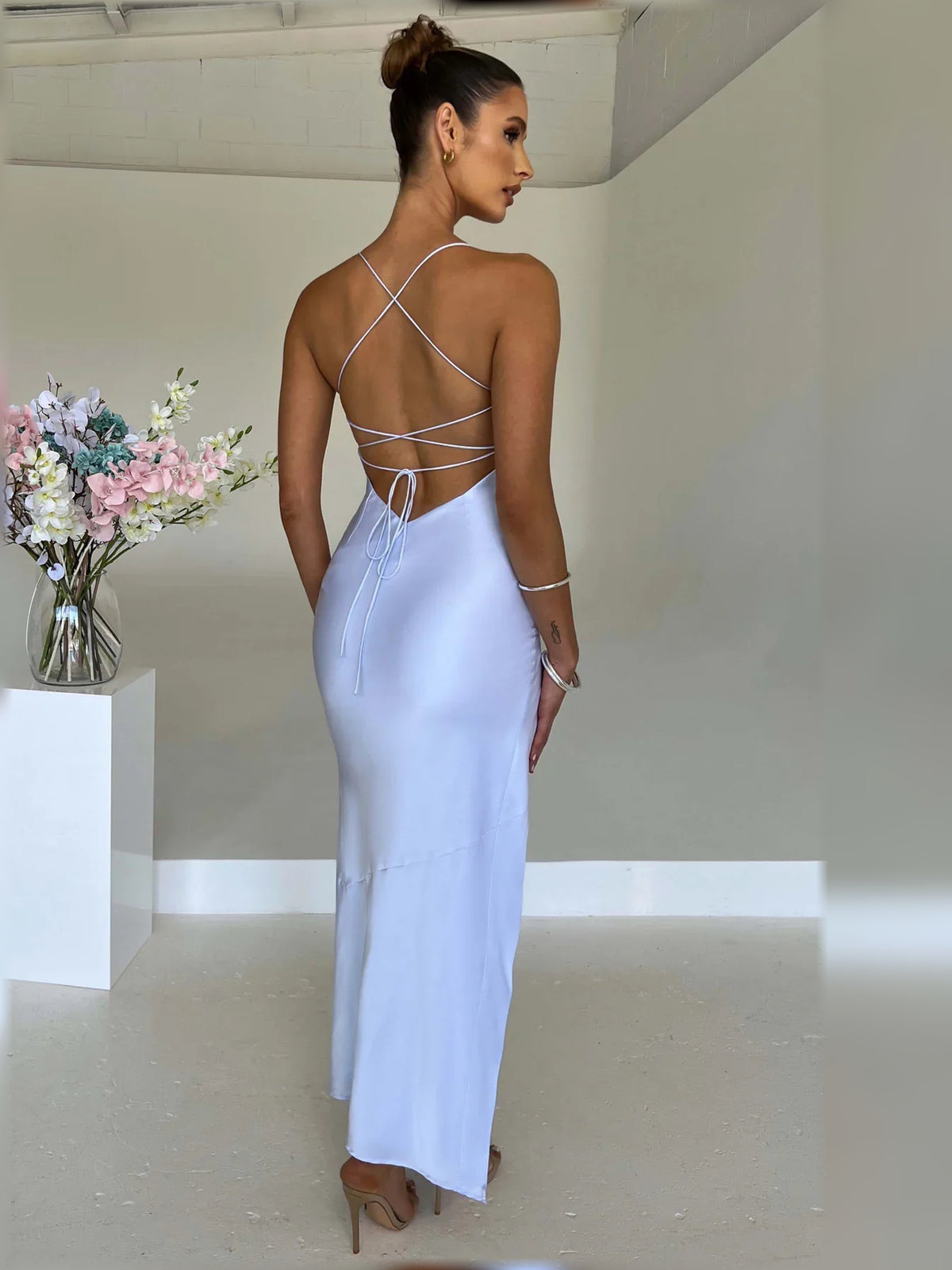 Ink Blue mermaid floor-length formal dress with skirt slit, alternate view showing the hem