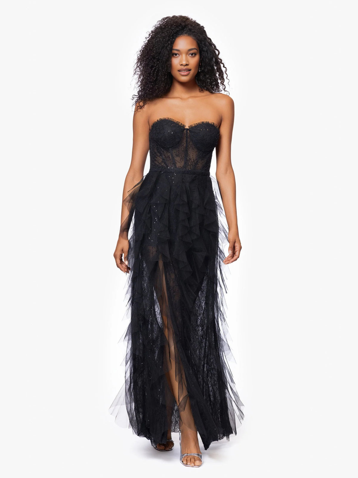 Black a-line floor-length formal dress with corset-style bodice, alternate view showing the hem