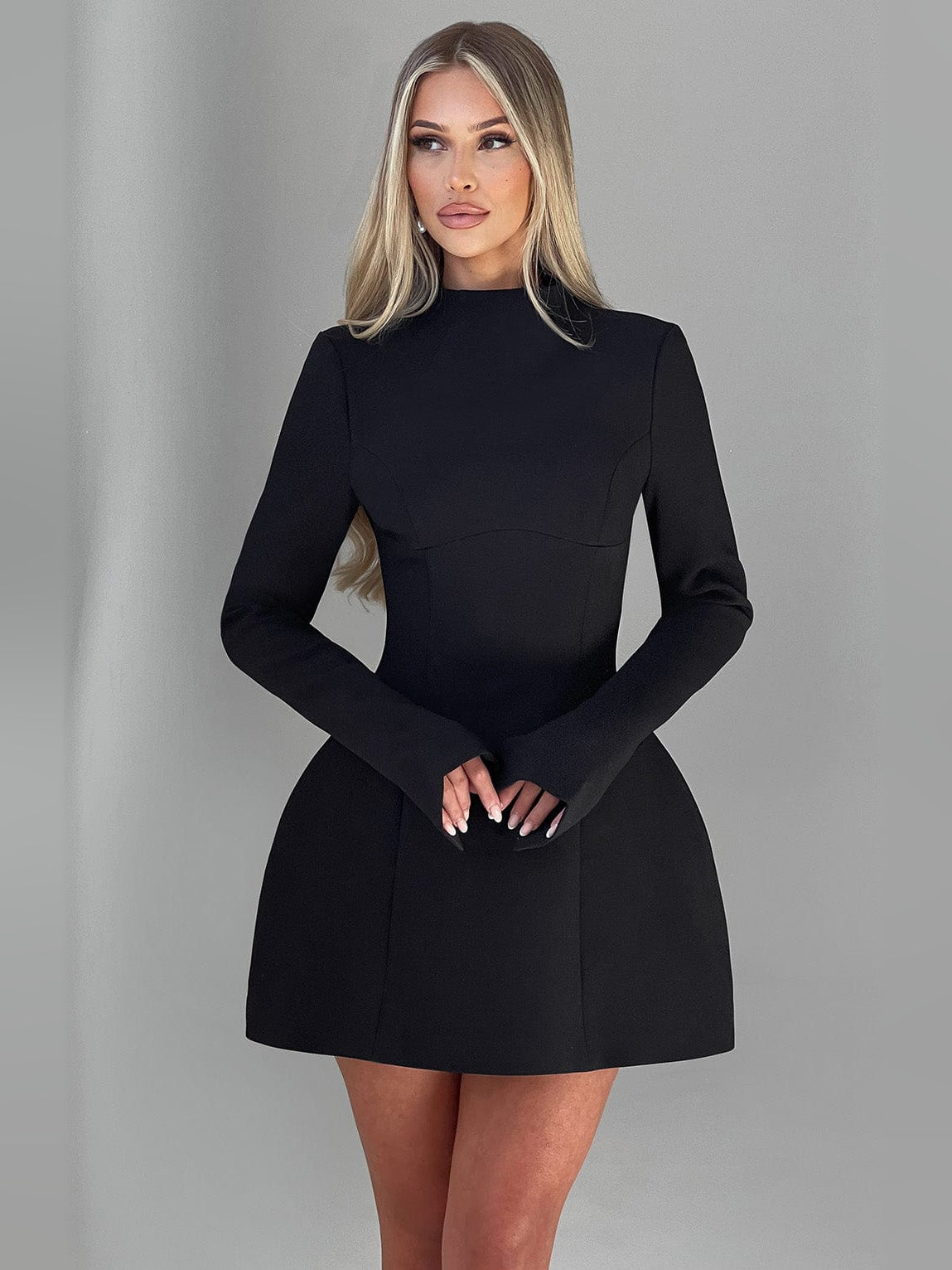 Black mini homecoming dress, alternate view showing the full-length silhouette