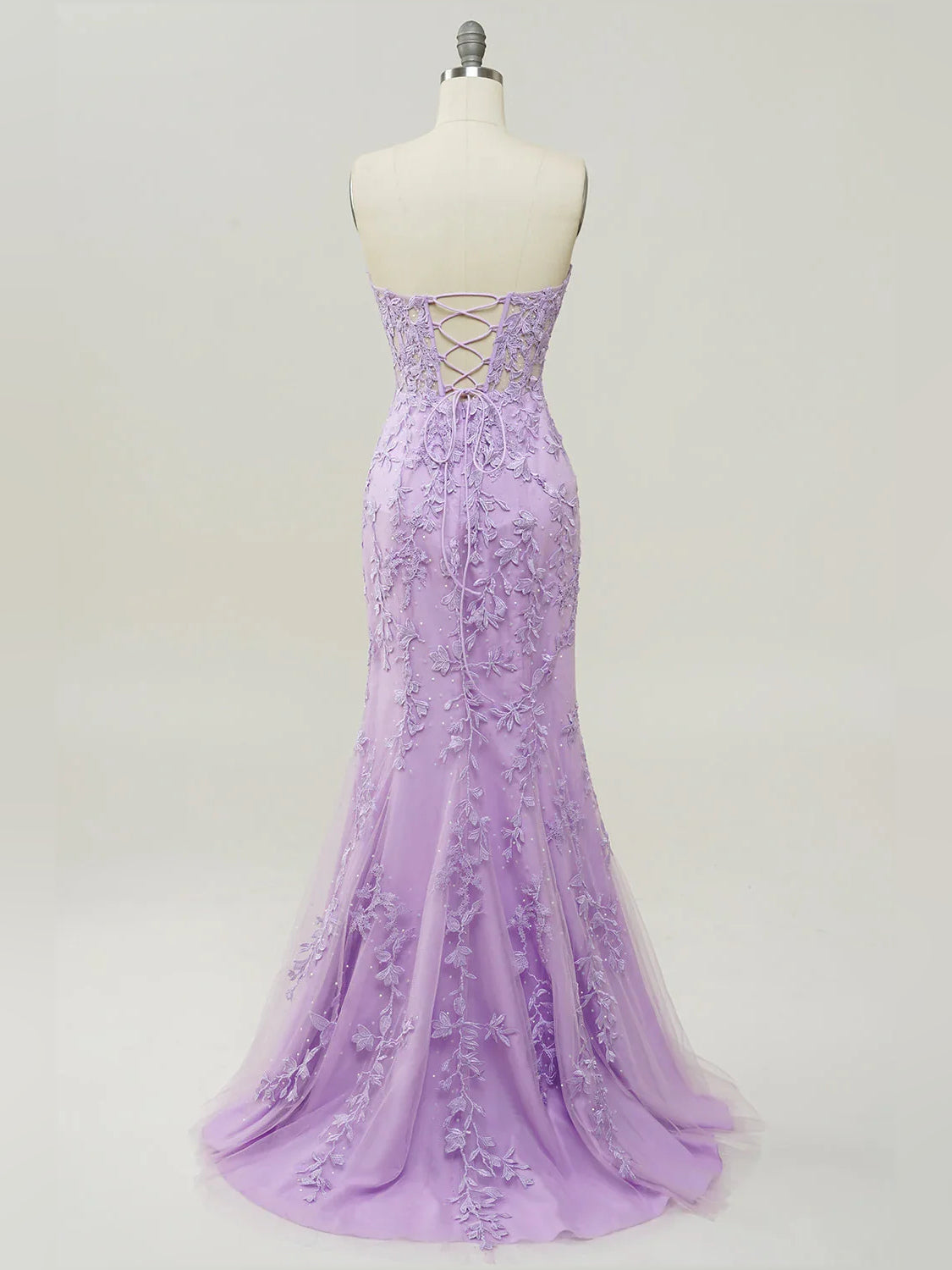 Lilac floor-length prom dress, back view showing the rear of the dress highlighting the overall dress