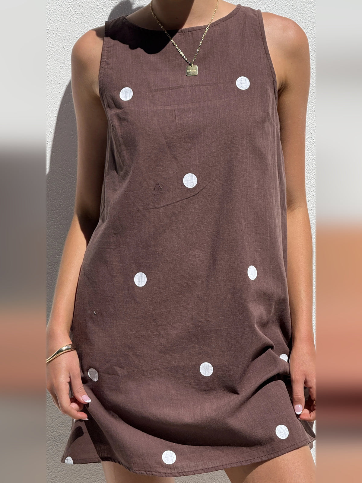 Chocolate White Polka Dot mini homecoming dress, alternate view showing the full-length silhouette