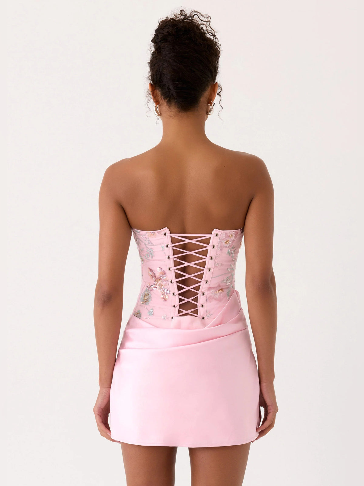 Pink mini homecoming dress, alternate view showing the full-length silhouette