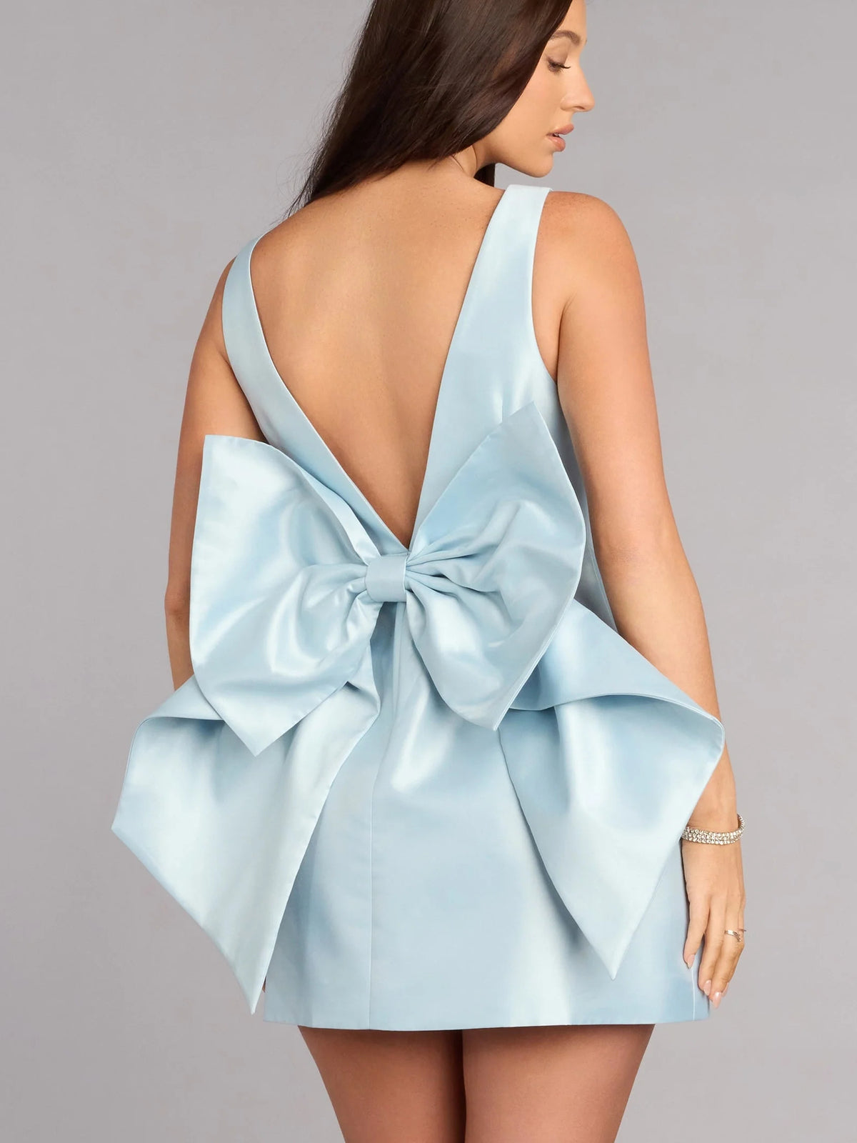 Gold mini homecoming dress, alternate view showing the full-length silhouette from another angle