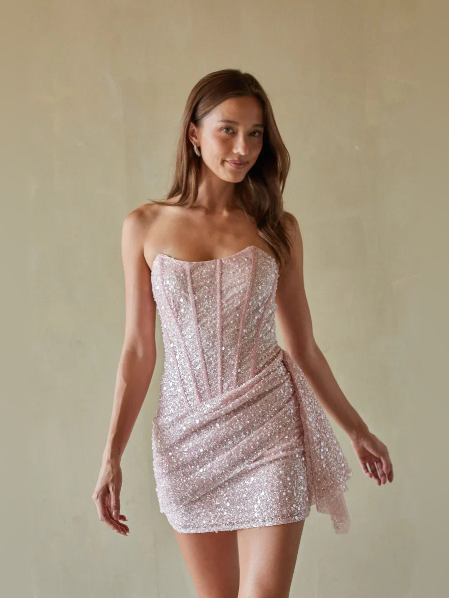 White mini homecoming dress, alternate view showing the full-length silhouette from another angle