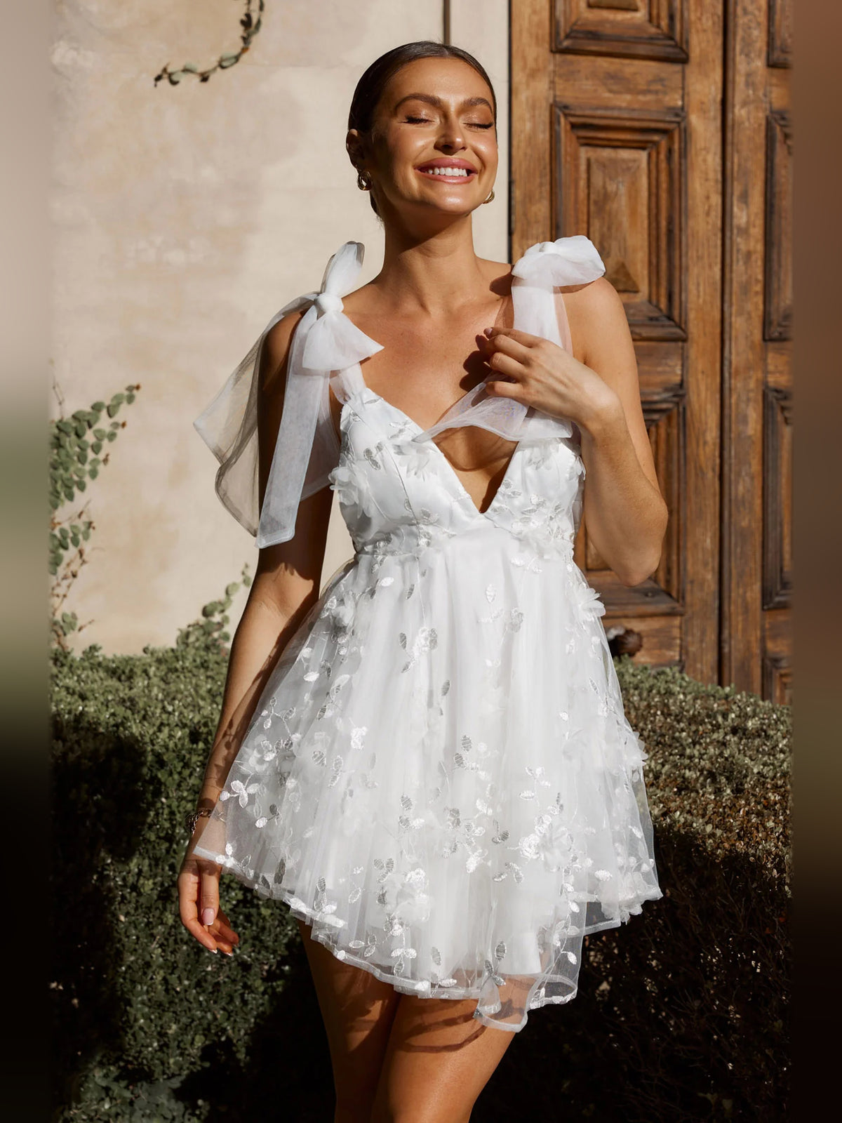 White mini homecoming dress, alternate view showing the full-length silhouette