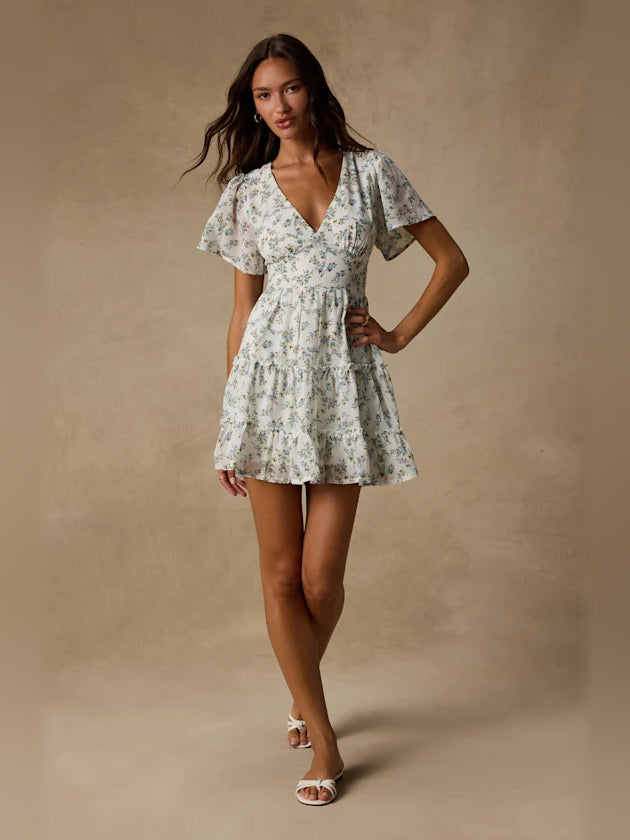 White Floral mini homecoming dress, alternate view showing the full-length silhouette
