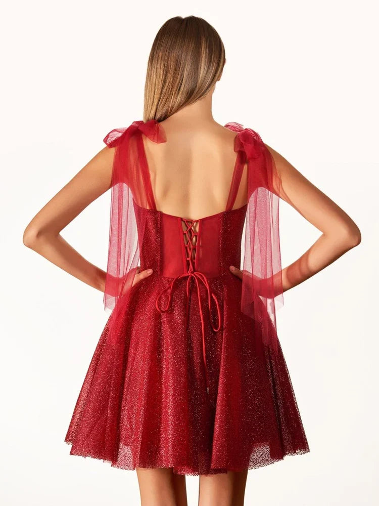 Ivory short homecoming dress, alternate view showing the full-length silhouette from another angle