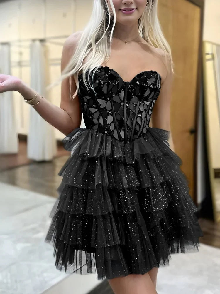 Black mini homecoming dress, alternate view showing the full-length silhouette