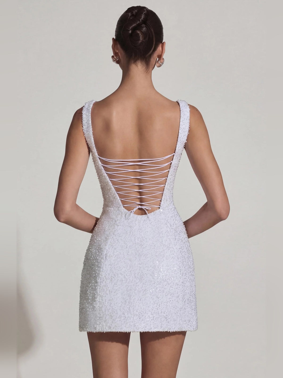 White mini homecoming dress, alternate view showing the full-length silhouette