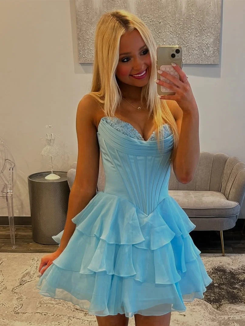 Red mini homecoming dress, alternate view showing the full-length silhouette from another angle