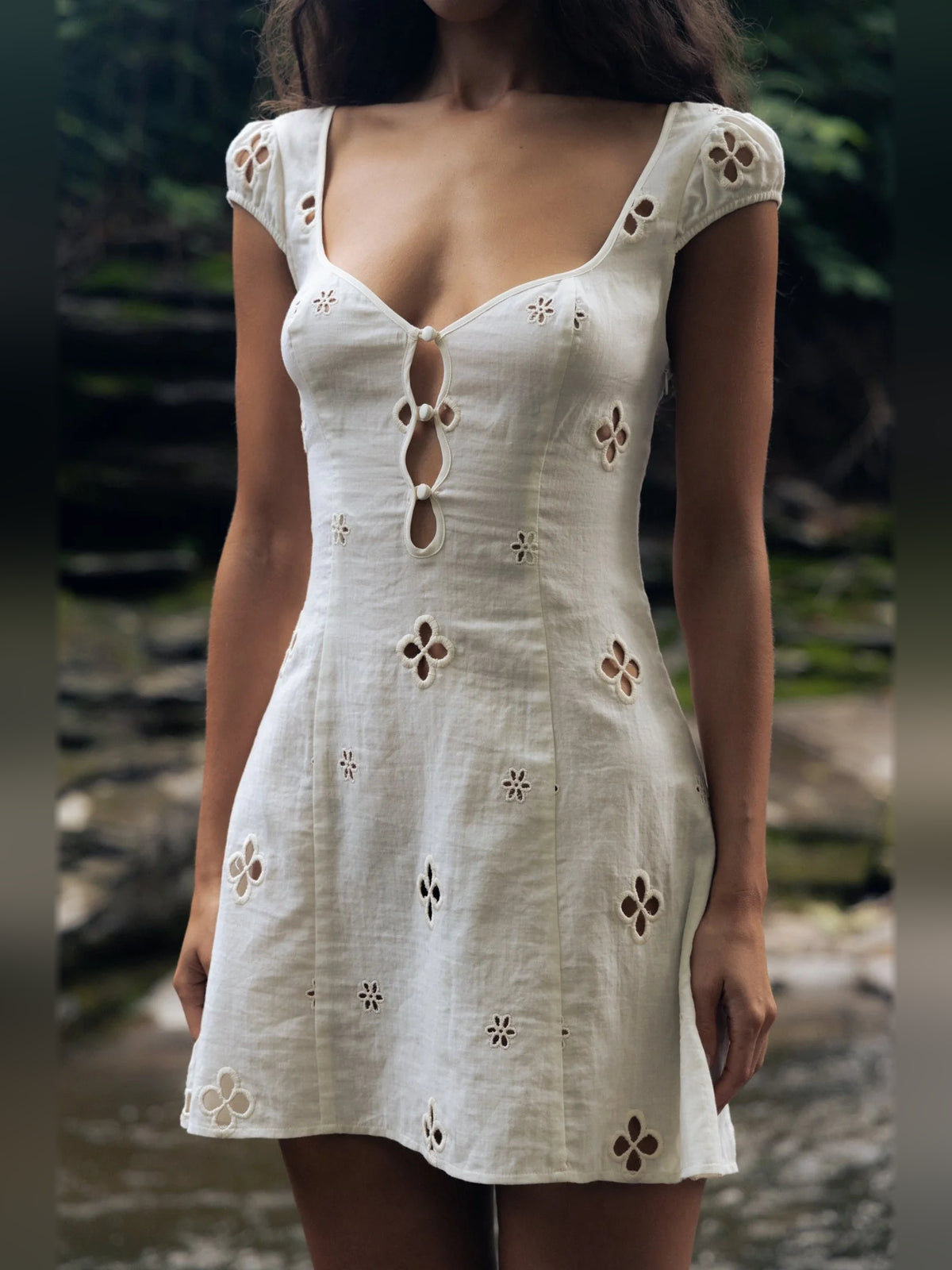 Ivory mini homecoming dress, alternate view showing the full-length silhouette from another angle