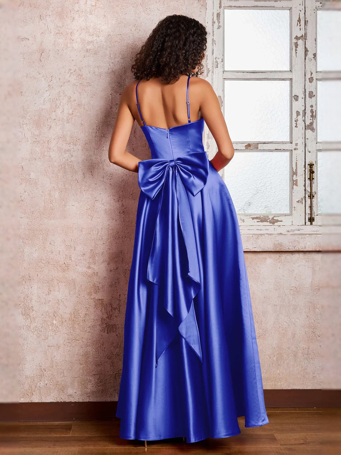 Watermelon floor-length prom dress, back view showing the rear of the dress showing the garment from a different position