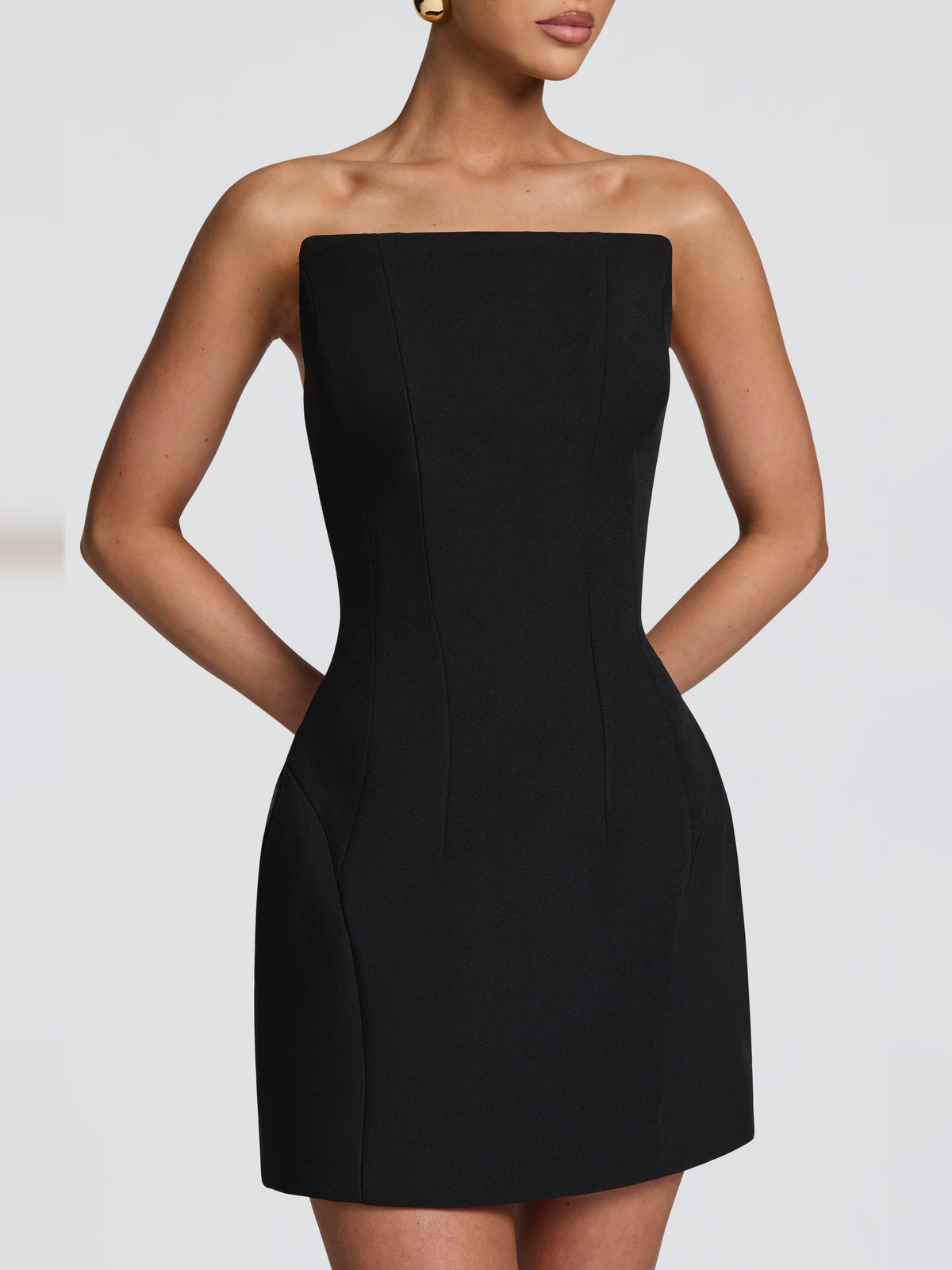 Black mini homecoming dress, alternate view showing the full-length silhouette