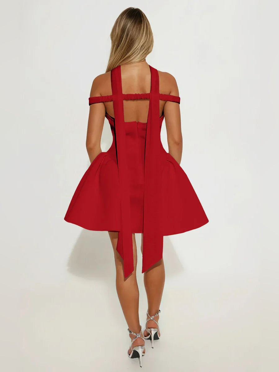 Black mini homecoming dress, alternate view showing the full-length silhouette from another angle