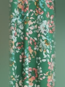 Green Floral mini homecoming dress, alternate view showing the full-length silhouette