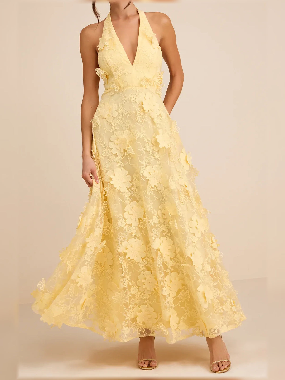 Black a-line maxi formal dress with floral appliqué, alternate view showing the overall silhouette