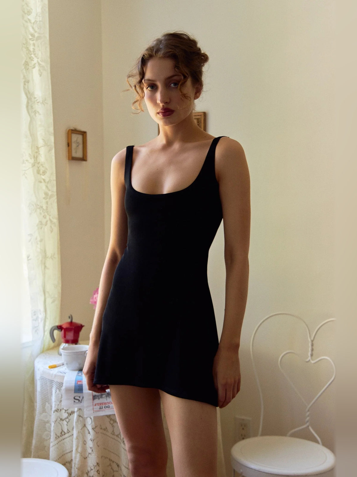 Black mini homecoming dress, alternate view showing the bodice and skirt