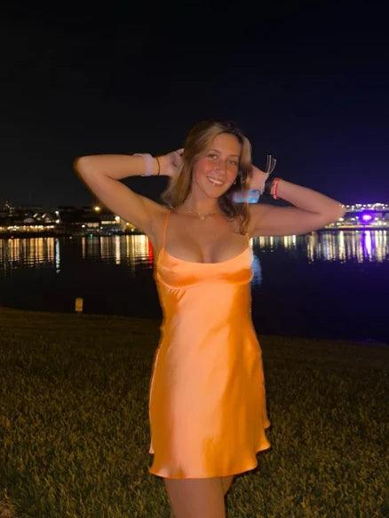 Orange mini homecoming dress, alternate view showing the bodice and skirt
