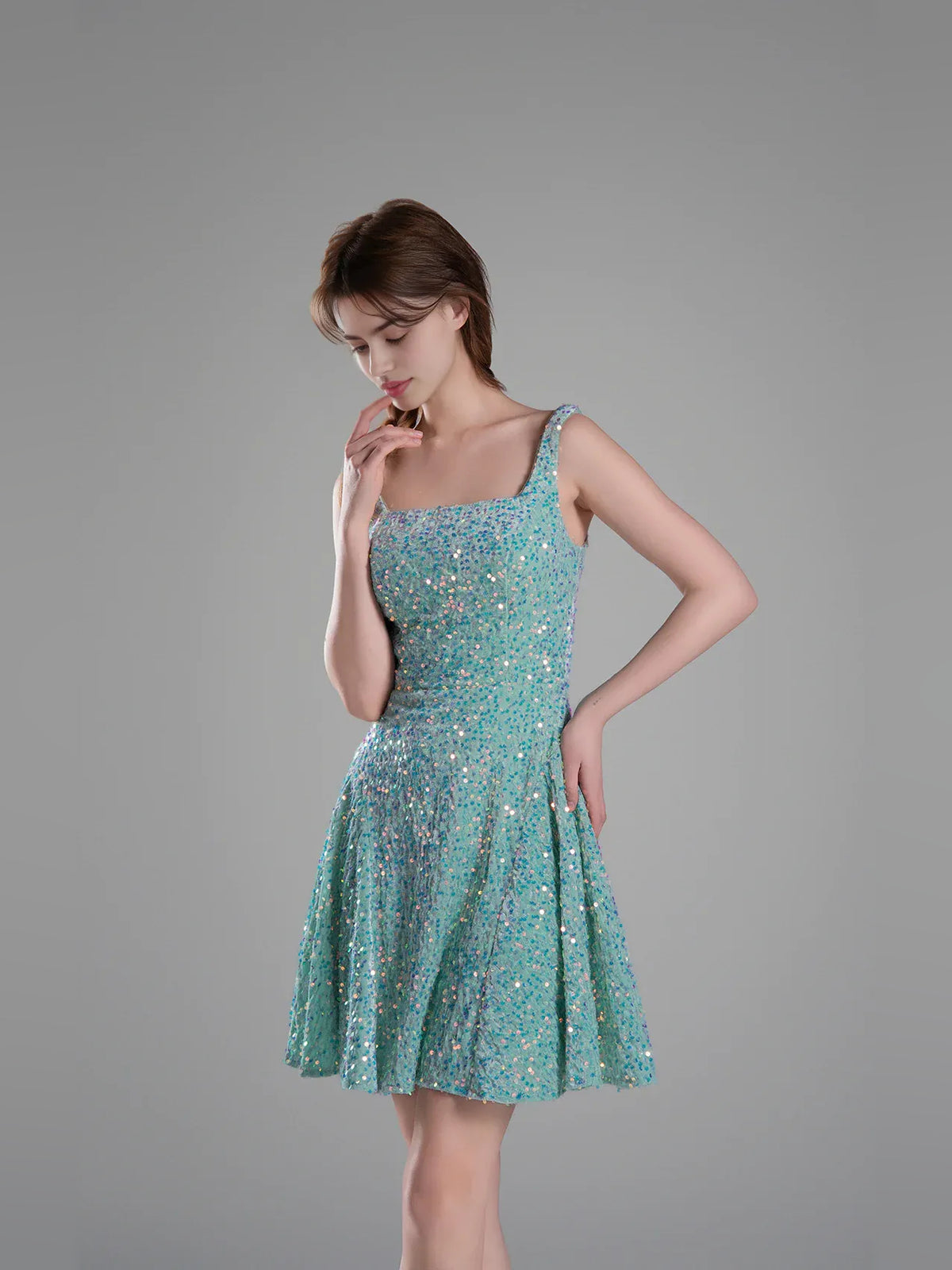 Turquoise mini homecoming dress, alternate view showing the bodice and skirt