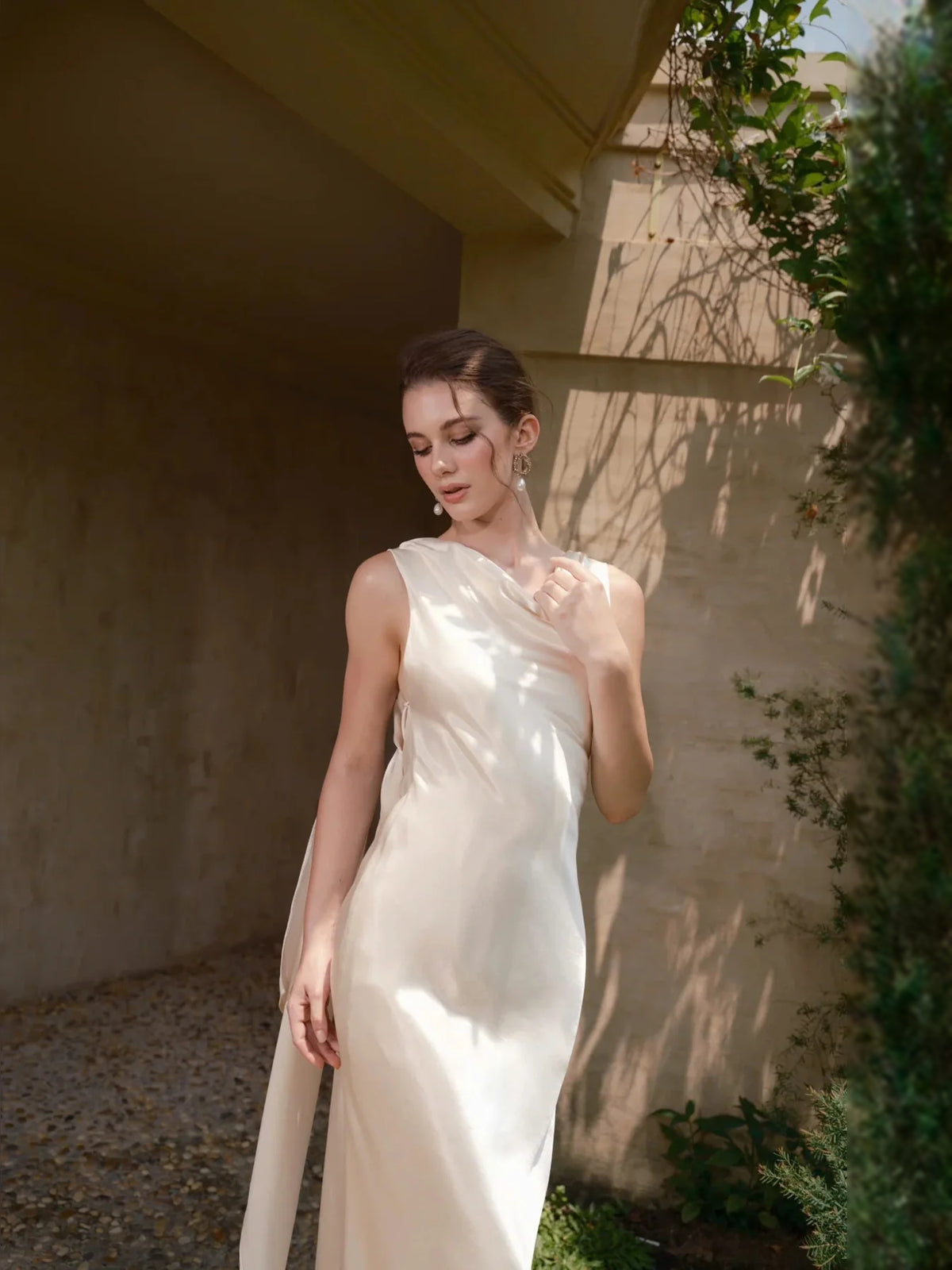 Ivory floor-length wedding dress, alternate view showing the bodice and skirt from another angle