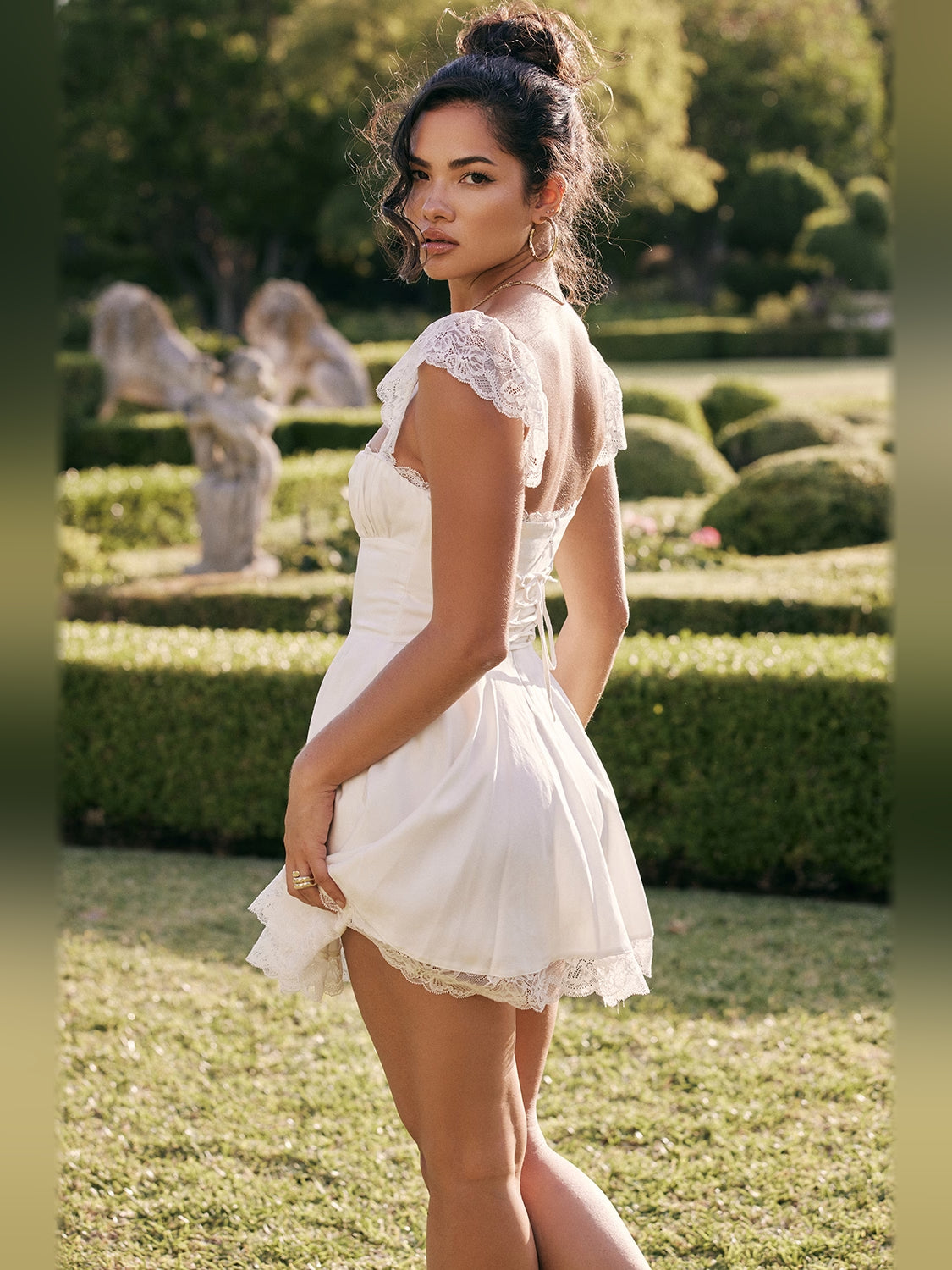 Ivory mini homecoming dress, alternate view showing the bodice and skirt from another angle