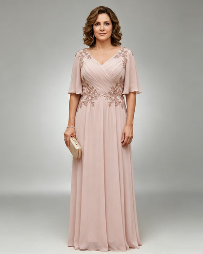 floor length chiffon mother of the bride A-line gown with flutter sleeves and beaded lace applique