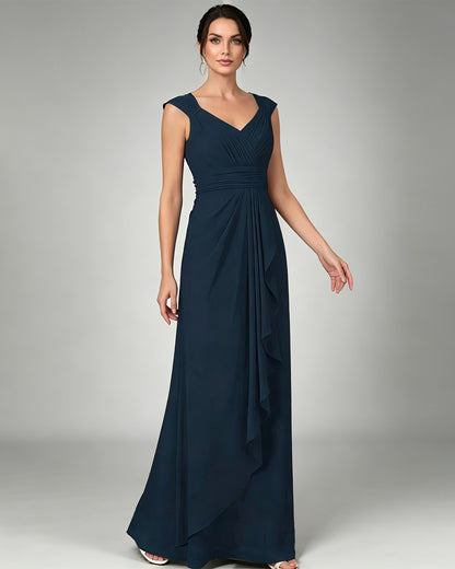 long sleeveless V-neck chiffon mother of the bride gown with pleated bodice and cascading ruffle detail