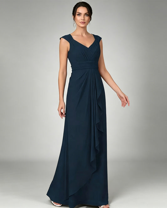 long sleeveless V-neck chiffon mother of the bride gown with pleated bodice and cascading ruffle detail