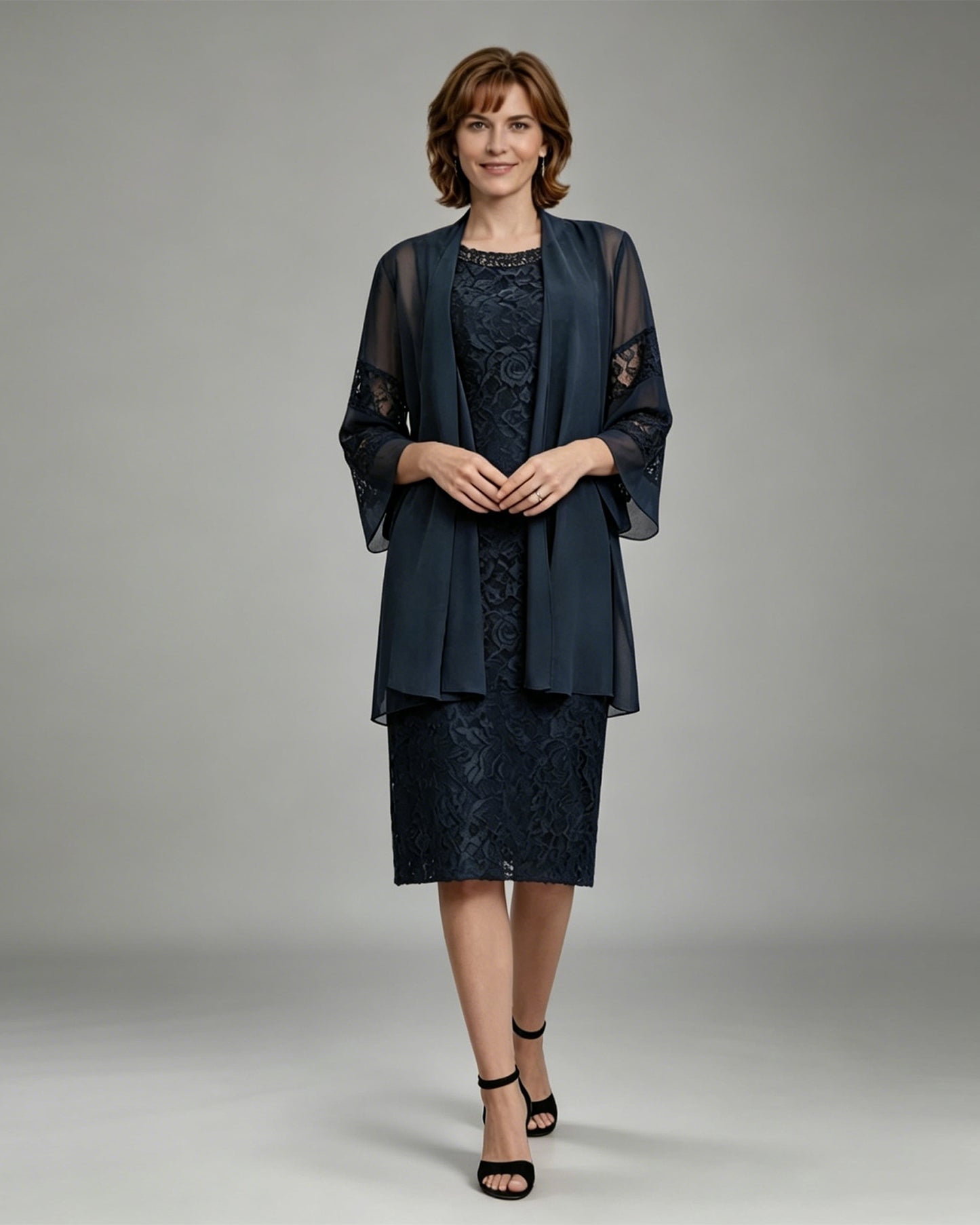 knee length lace mother of the bride dress with matching sheer chiffon jacket