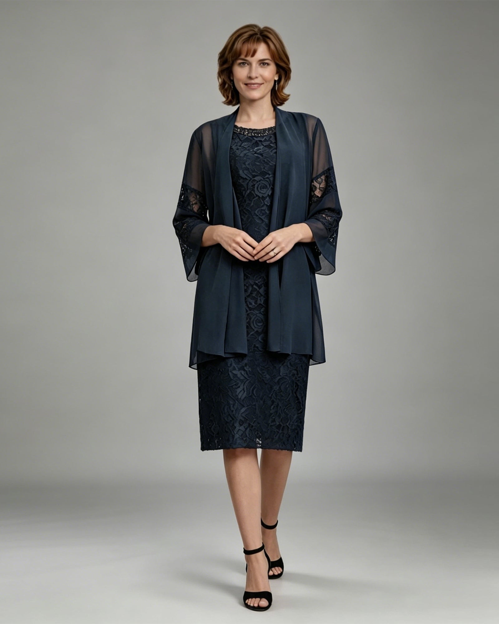 knee length lace mother of the bride dress with matching sheer chiffon jacket