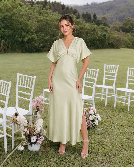 pastel green empire waist satin bridesmaid dress with flutter sleeves and side slit - image 1