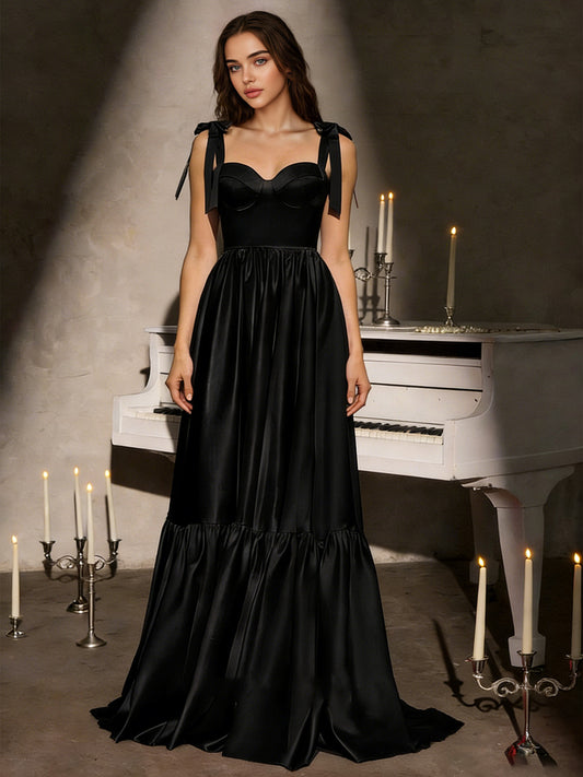 black strapless tulle ball gown with bow straps and corset bodice - image 1