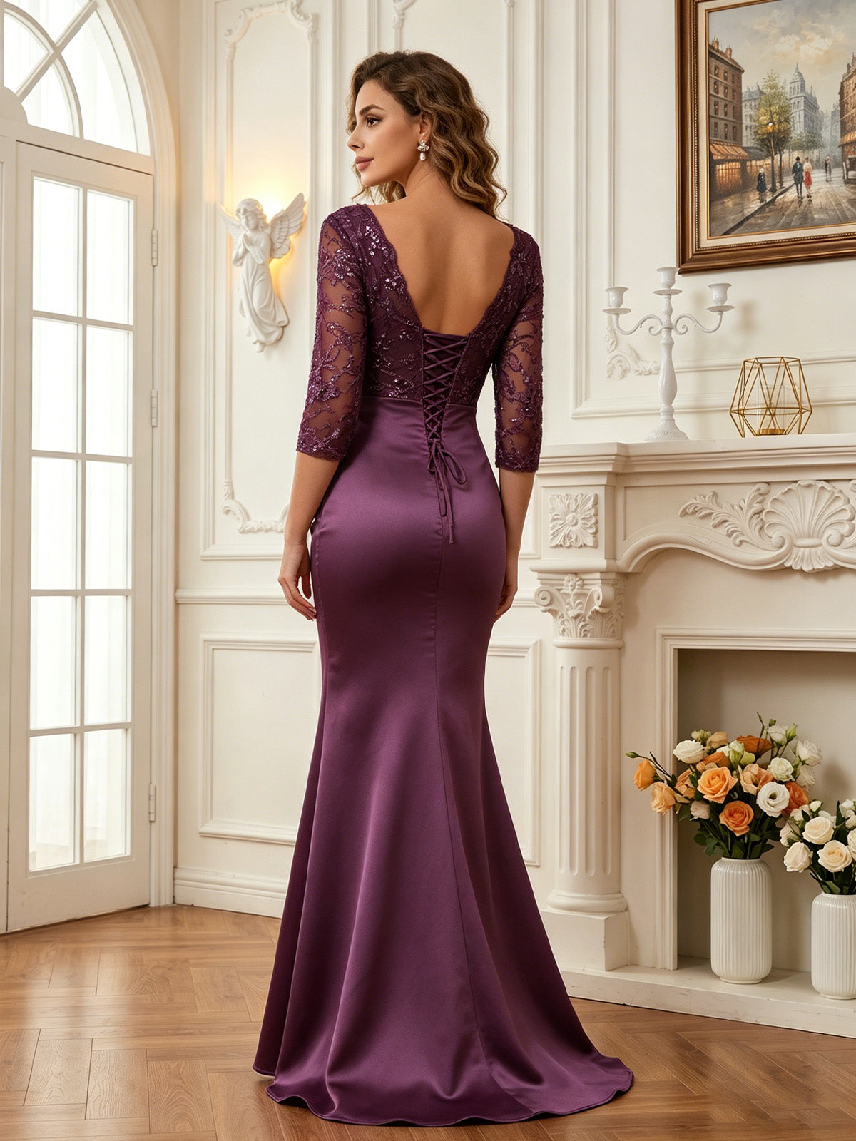 formal lace mother of the bride gown shown in an elegant indoor wedding setting
