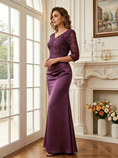 side view of floor length mermaid wedding guest gown with elegant lace sleeves