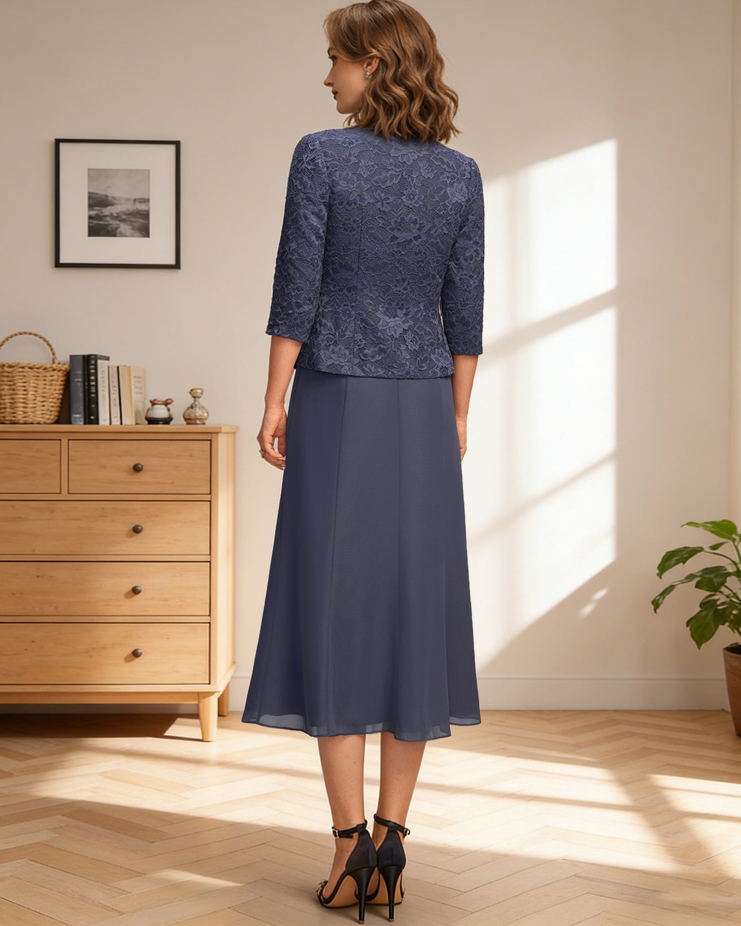 tea length mother of the bride dress with lace jacket, chiffon A-line skirt, and brooch waist detail full outfit view for ceremony and reception occasions