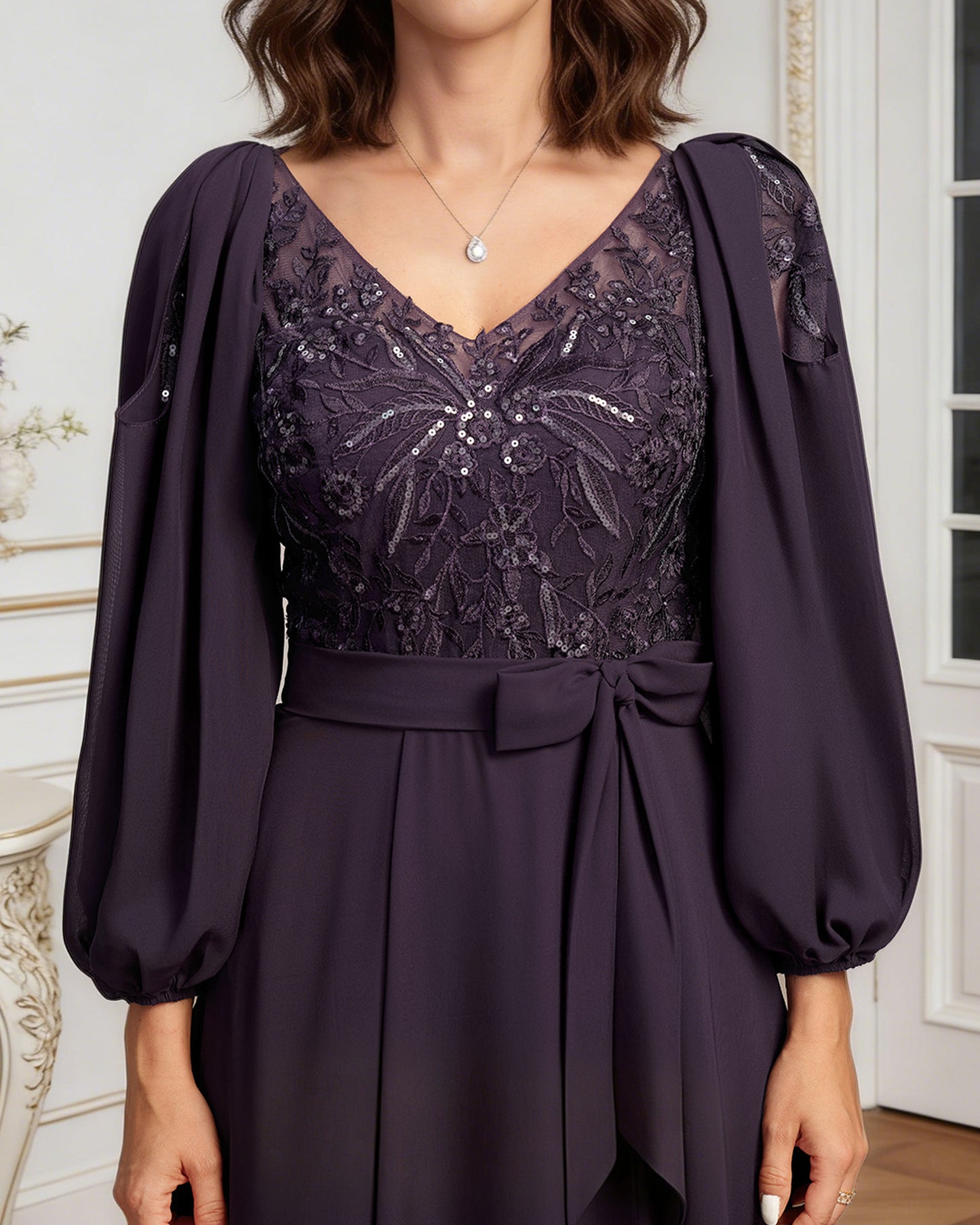 high low mother of the bride dress with lace bodice, chiffon jacket sleeves, tie waist, and layered skirt full outfit view for ceremony and reception occasions