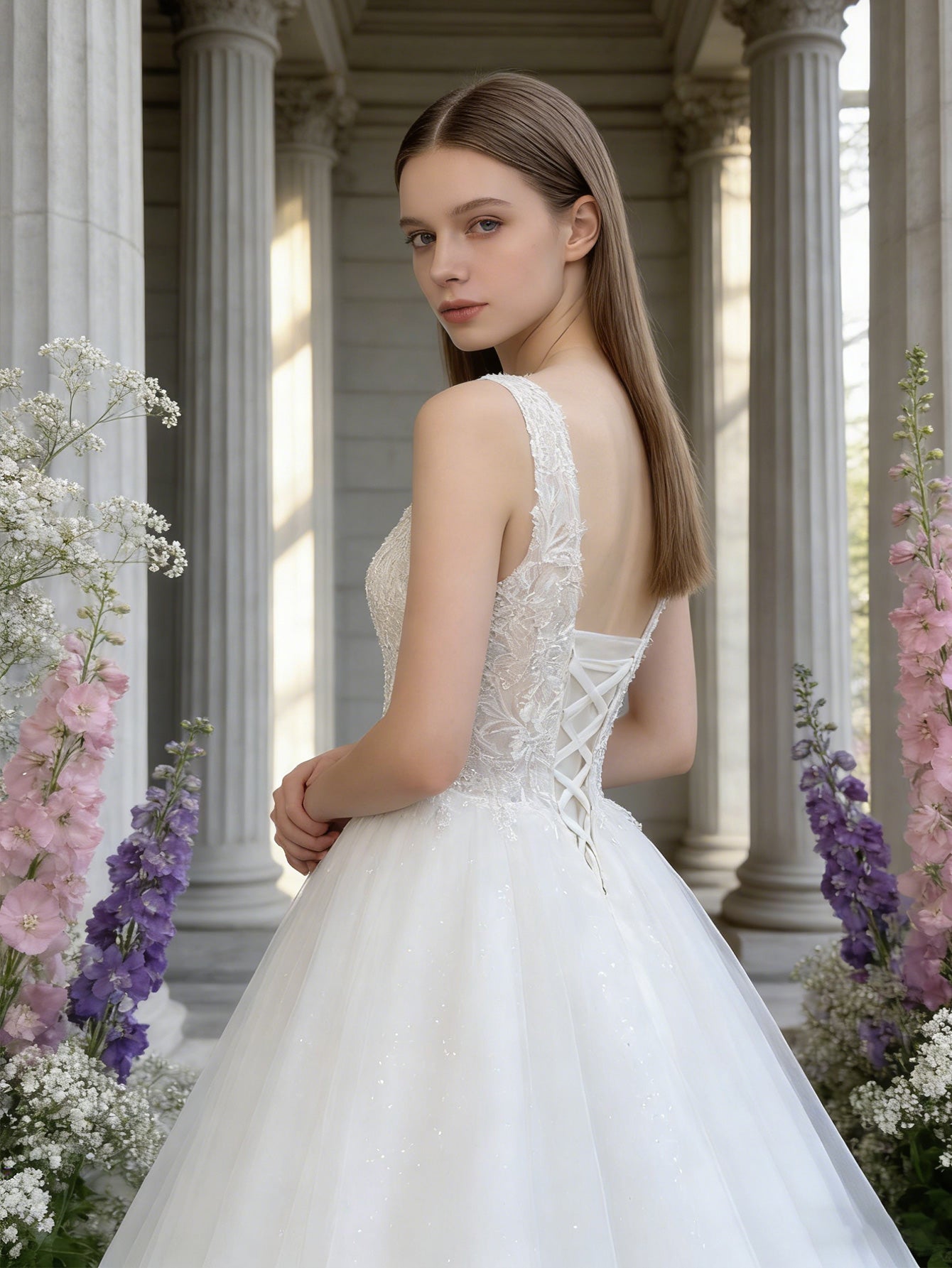 sleeveless V-neck tulle wedding dress with lace bodice and full skirt - image 5