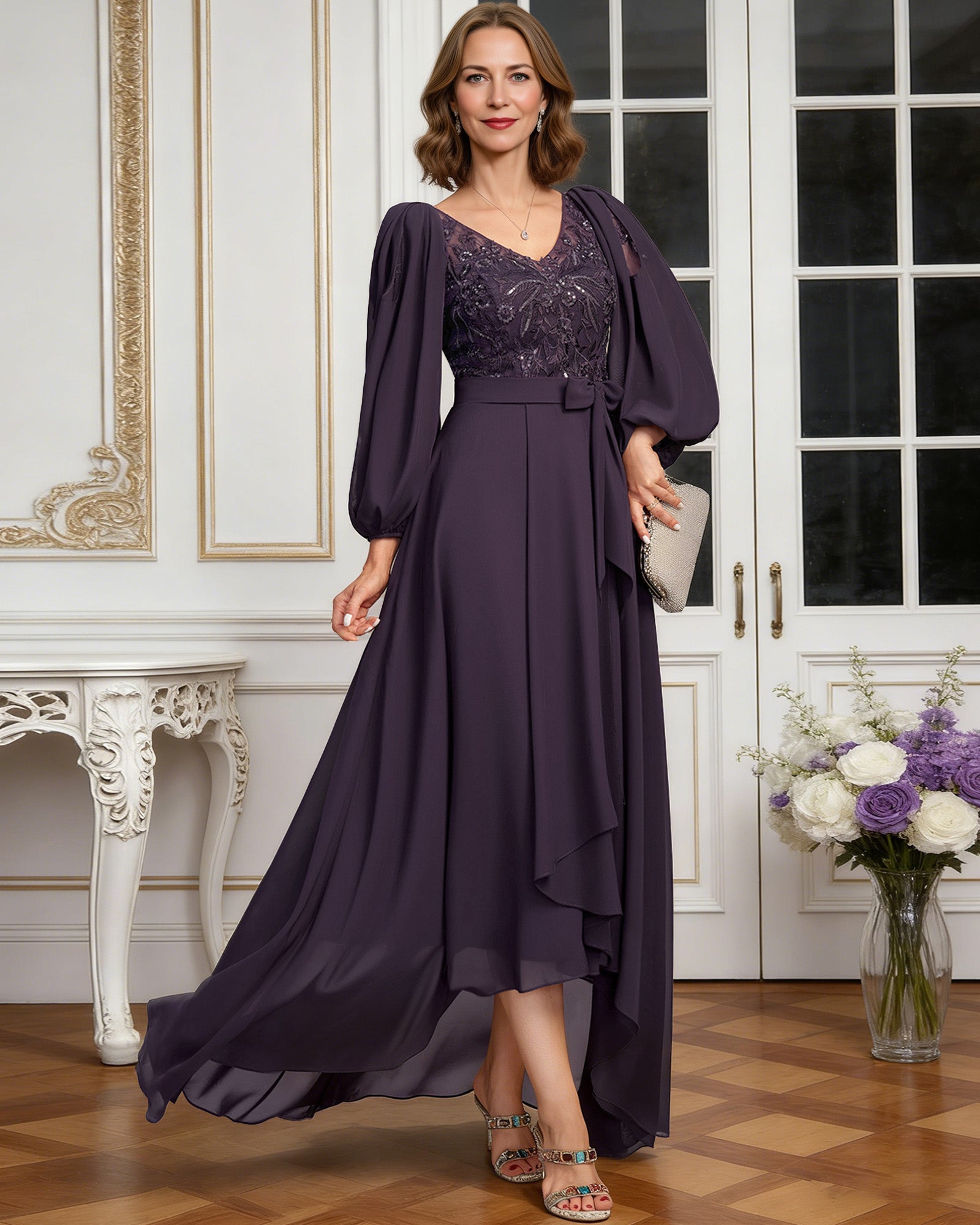 high low mother of the bride dress with lace bodice, chiffon jacket sleeves, tie waist, and layered skirt alternate angle showing the formal dress silhouette and drape